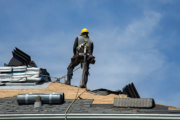 Professional Roof Replacement technician working in Harper, KS